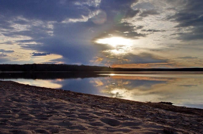 "Our day ends with a beautiful sunset at the Sandy Beach Campground - with loons calling in the background"
